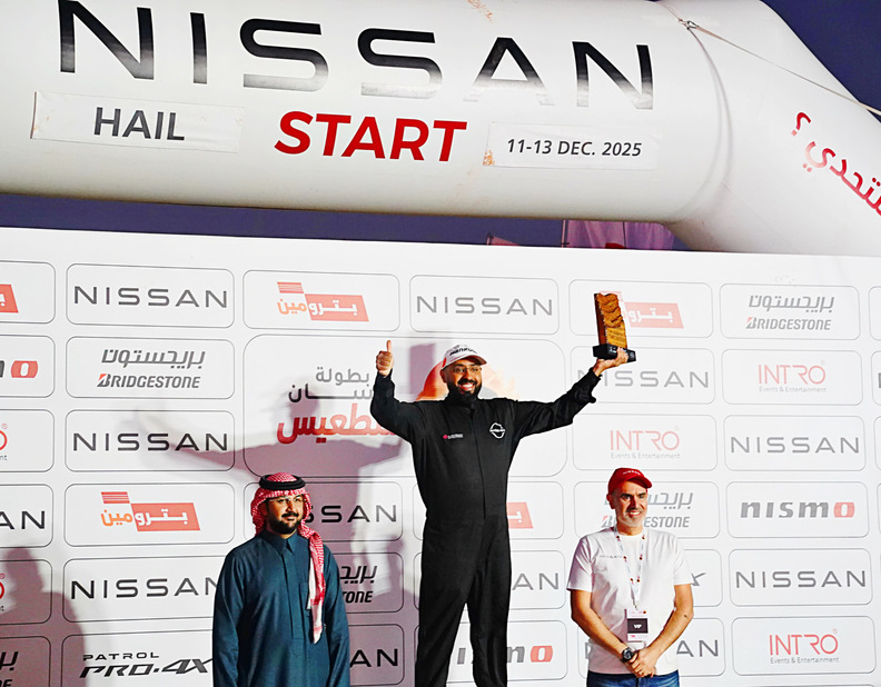 Saudi winner and driver Saeed Al-Mouri